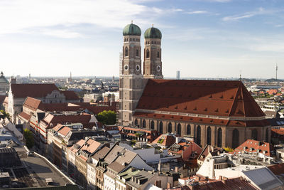 High angle view of buildings in city against sky