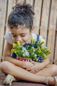 Cute girl holding flower