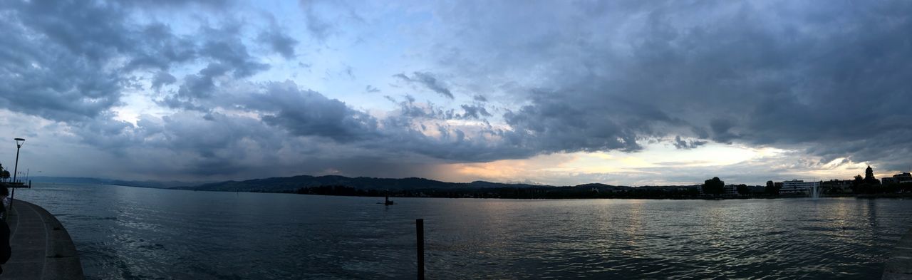 PANORAMIC VIEW OF SEA AGAINST SKY DURING SUNSET