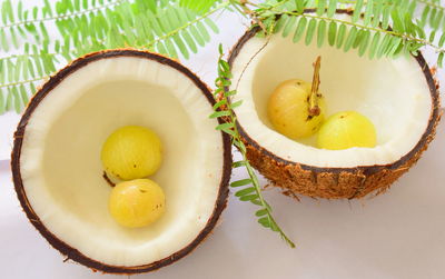 High angle view of fruits in plate on table