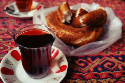 Close-up of tea and food on table