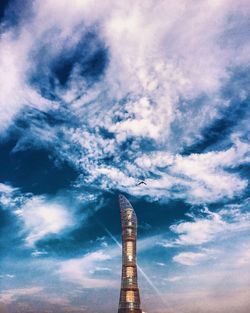 Low angle view of bird against sky