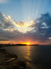 Scenic view of sea at sunset