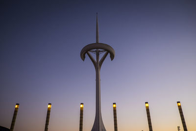 Low angle view of illuminated street light against clear sky