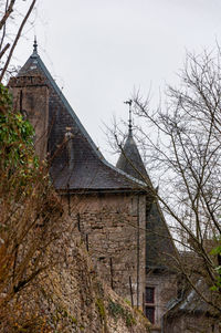 Low angle view of old building against sky