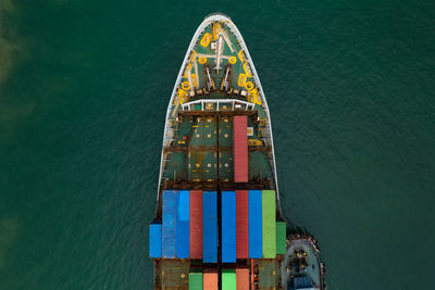 High angle view shipping containers transportation sailing on the sea 