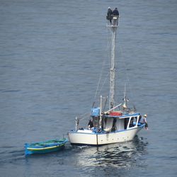 High angle view of sailboat sailing in sea