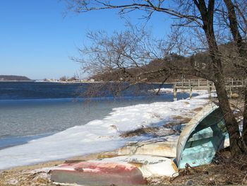 Scenic view of sea against clear sky during winter