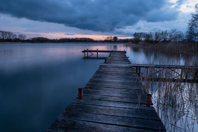 A wooden pier on a water reservoir in stankow, poland