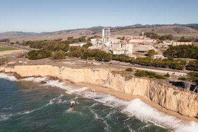 Old abandoned cement plant in davenport, california. aerial photo.