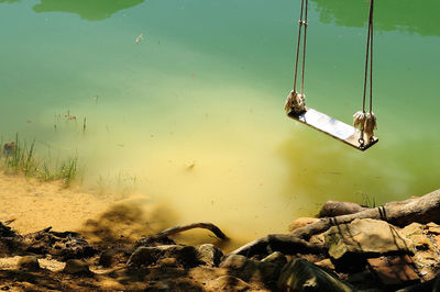 Reflection of rocks on water in lake