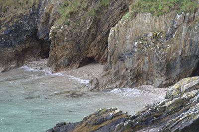 Close-up of rocks in water