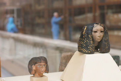 Close-up of egyptian statues for display at museum