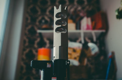 Close-up of text on metal pole