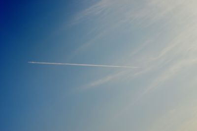 Low angle view of vapor trail in sky