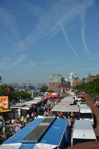 View of cityscape against blue sky