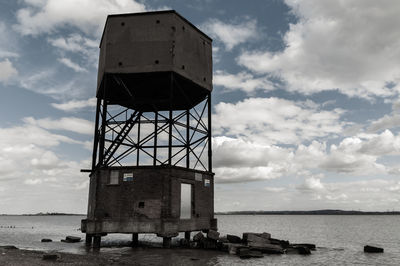 Low angle view of tower against sky