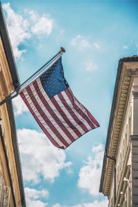 Low angle view of flag against sky