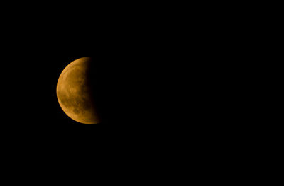 Scenic view of moon against clear sky at night