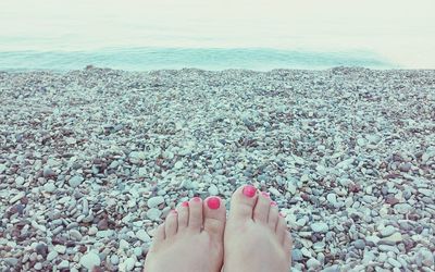 Low section of woman on beach