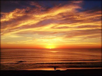 Scenic view of sea at sunset