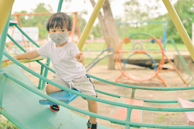 Boy playing in playground