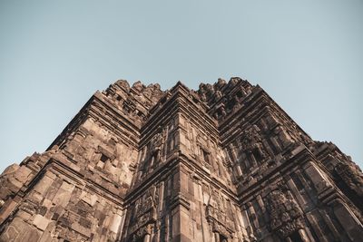 Low angle view of old building against clear sky