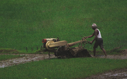 Man working on field