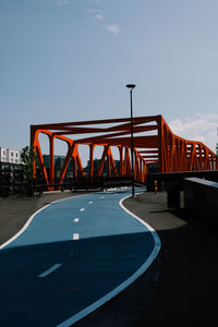 Bridge against sky in city