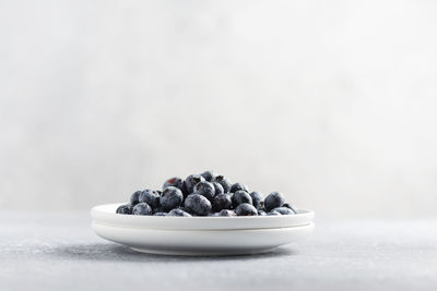 Close-up of black fruits in bowl