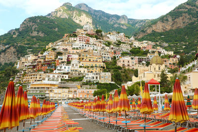 Panoramic view of buildings and mountains against sky