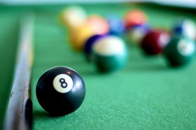 Close-up of pool balls on table