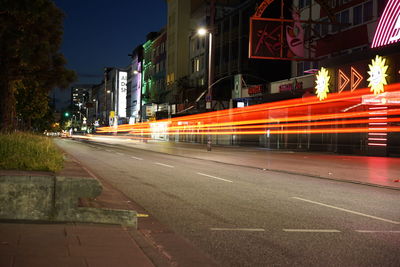 Light trails on city street at night