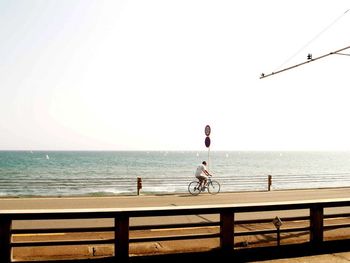 Scenic view of sea against clear sky