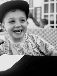 Smiling boy wearing cap