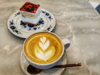 Close-up of cappuccino on table