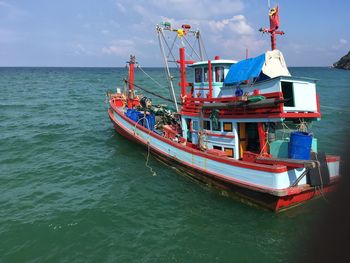 Boat on sea against sky