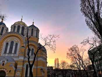 Low angle view of city at sunset