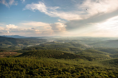 Aerial view of landscape against sky during sunset