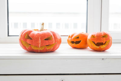 Orange pumpkin on table