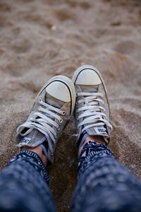 Low section of person standing on ground