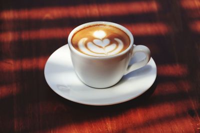 Close-up of cappuccino on table