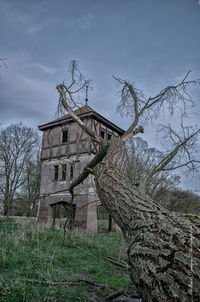 Abandoned building against sky