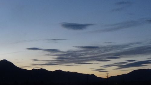 Silhouette of mountain against sky during sunset