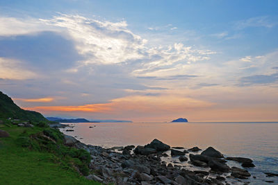 Scenic view of sea against sky during sunset