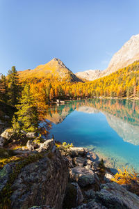 Scenic view of lake against sky during autumn