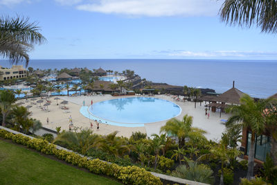 High angle view of pool and sea against sky