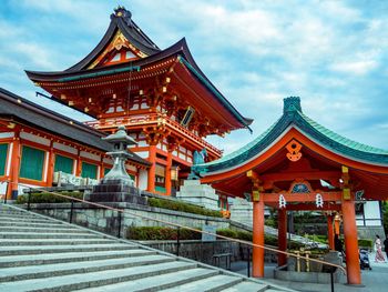 Temple against cloudy sky