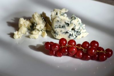 High angle view of berries in plate on table