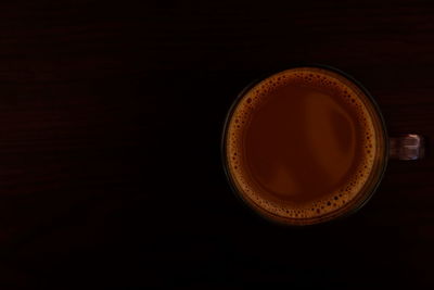 Directly above shot of coffee cup on table